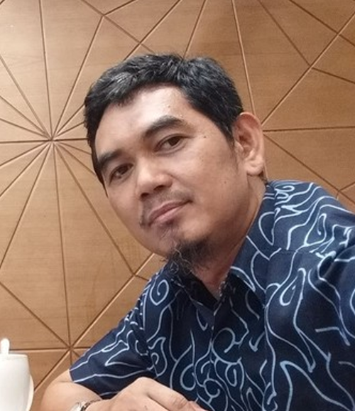 Zaini Hasan, S.E., M.M.